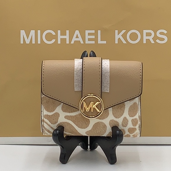 MICHAEL KORS
Carmen Medium Flap Bifold Faux Fur-Leather Wallet
Camel color - Picture 2 of 16